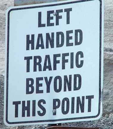 Traffic sign indicating left-hand traffic ahead